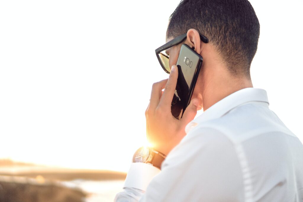 man on phone for phone interview